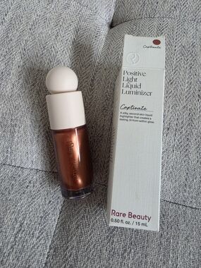 Rare Beauty Positive Light Liquid Luminizer — Captivate Warm Copper - FULL SIZE